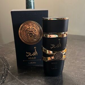 Lattafa Asad Black & Gold Perfume Bottle